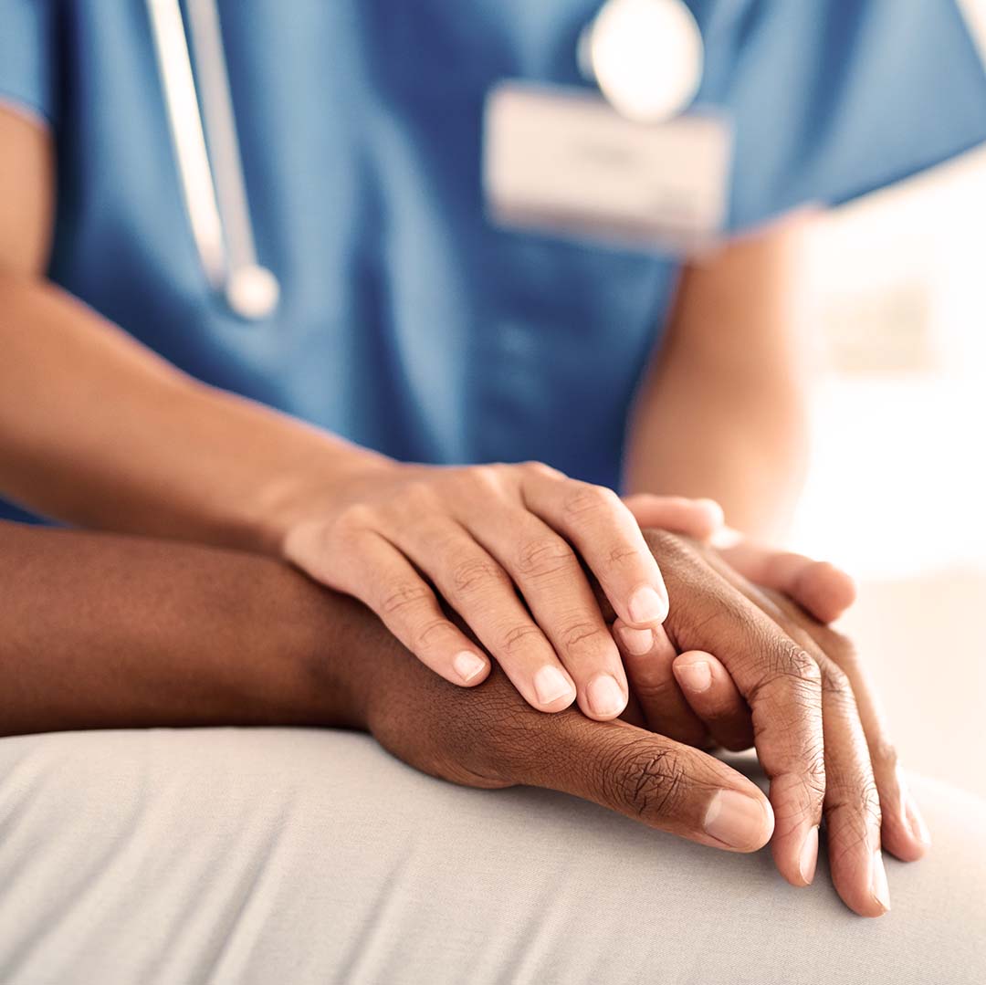 A doctor holding a patient's hand.  Jamber is a hand care company.  We are a free all-natural alternative to physical therapy or occupational therapy.  We offer natural arthritis hand treatment, carpal tunnel treatment, and trigger finger treatment.