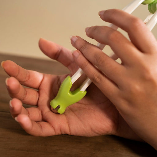 A green Jamber hand and wrist massager is the best hand massager for arthritis, and a great hand care product. This hand and wrist massager is a hand massager with rollers and a steel ball. It's the best massager for arthritic hands.